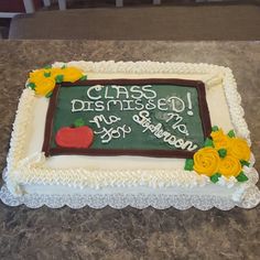 a cake that has been decorated with flowers and the words class disarrayed on it