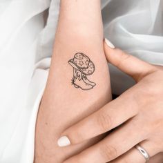 Small Tattoo by 1991.ink Nashville Mini Tattoo, Cowboy Boot Tiny Tattoo, Small Cowgirl Tattoos For Women, Tiny Cowgirl Boot Tattoo, Fineline Cowboy Boot Tattoo, Cowboy Boot Stamp Tattoo, Cowboy Boots With Hat Tattoo, Cowgirl Boot Tattoo Ideas, Cowboy Hat Boots Tattoo