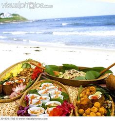 food is laid out on the beach to be eaten