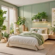 a bedroom with green walls and lots of plants