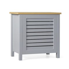 a grey cabinet with wooden top and drawers on the bottom, in front of a white background