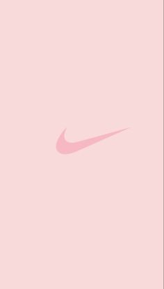 a pink nike wallpaper with the logo on it