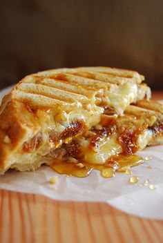 a grilled cheese sandwich is sitting on a plate