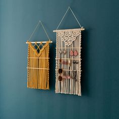 two wall hangings made out of macrame