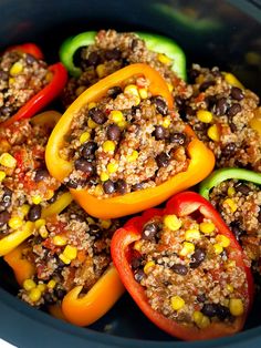 stuffed peppers with black beans and corn in a slow cooker, ready to be eaten