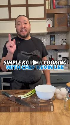 a man standing in front of a kitchen counter with food on it and the words simple kori cooking with chef ken lee