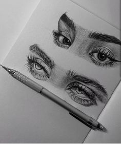 a pencil drawing of two eyes and one eye with long lashes on top of it