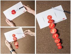 someone cutting tomatoes with a knife on top of a piece of paper that has been cut in half