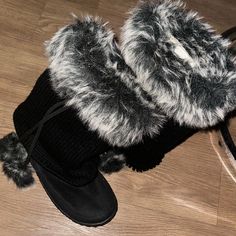 Mid Calf Casual Faux Fur Boots For Cold Weather, Black Faux Fur Boots With Round Toe, Black Casual Boots With Faux Fur Trim, Winter Black Boots With Faux Fur Trim, Black Boots With Faux Fur Trim, Black Faux Fur Boots With Trim, Black Boots With Faux Fur Trim For Cold Weather, Black Boots With Faux Fur Trim For Fall, Black Faux Fur Boots For Winter