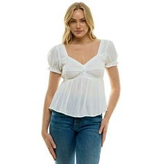 Infuse your wardrobe with a touch of texture and sweetness with the Derek Heart Juniors Lace Patch Crinkle Top. This charming top features a soft, crinkled fabric that adds a touch of dimension and effortless style. The relaxed silhouette drapes comfortably over your form, while the short sleeves keep you cool and comfortable on warm days. The standout feature of this top is the delicate lace patch detail on the front. In a contrasting color to the top itself, the lace patch adds a touch of femi Empire Waist Babydoll Dress, Summer Gingham, Crinkled Fabric, Crinkle Top, Tiered Blouse, Orange Chiffon, Target Clothes, Gingham Tops, Ladies Of London