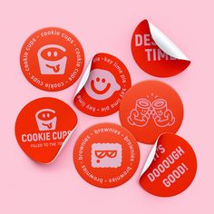 some red stickers that say cookies cupcakes and doughnuts