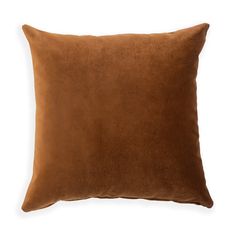 a brown pillow on a white background