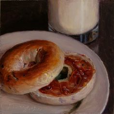 a painting of two bagels on a white plate next to a glass of milk