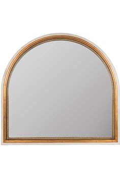 an arch shaped mirror with gold trimming