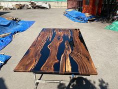 a table that has been made to look like it is in the process of being painted