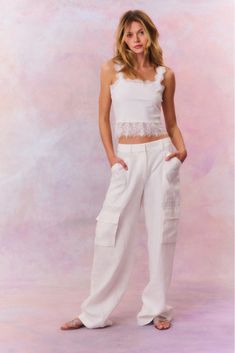 Linen straight leg cargo pants featuring pockets on each leg and on the side