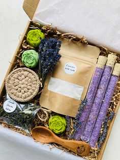 an open box filled with different types of lavenders and other things to make it look like