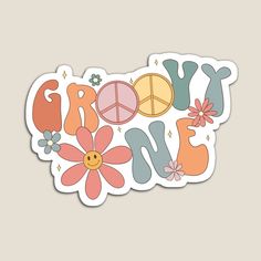 a sticker that says grooy with flowers and peace signs in the middle