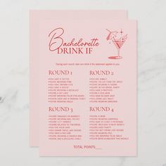 a pink cocktail menu on a marble table