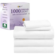 the white sheet set is next to it's box