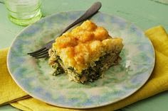 a piece of food on a plate with a fork