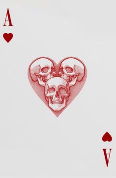 playing cards with two skulls in the middle and one heart at the top on each side