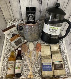 an assortment of coffee and condiments in a box