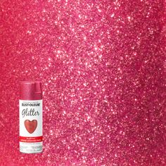 pink glitter paint next to a bottle of glue