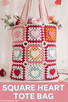 a crocheted tote bag with hearts on it and the text, square heart tote bag