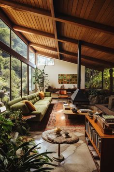 a living room filled with furniture and lots of windows