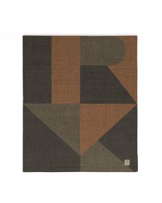 a brown and black rug with an abstract design