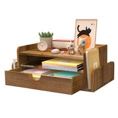 a wooden desk with two drawers and an animal figurine