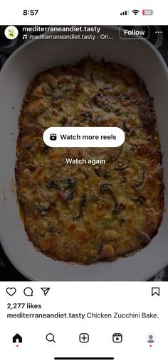 a white plate topped with a casserole covered in cheese and mushrooms next to an instagram sticker