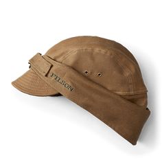 This abrasion-resistant, water-repellent hat is lined with 100% virgin wool sourced from the USA, for sweat-wicking warmth and comfort. It has protective wool neck flaps and earflaps to block wind and driving rain. A D-ring buckle adjustment allows for a custom fit. | Filson Tin Cloth Wildfowl Hat Tan Size XL 일본 패션, Dark Tan, Cool Hats, D Ring, No. 2, Custom Fit, Water Repellent, Caps Hats, Hair Hair