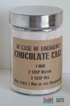 an empty glass jar filled with chocolate cake mix