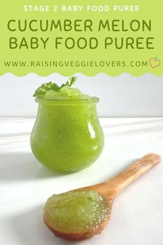 a green baby food puree in a glass jar next to a wooden spoon with the words cucumber melon baby food pure