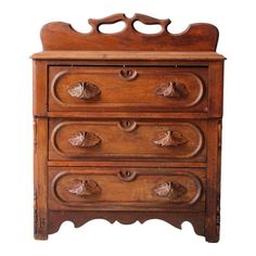 an old wooden dresser with drawers and knobs on the bottom drawer, isolated against a white background