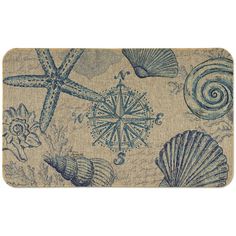 an area rug with shells and starfishs on it