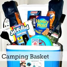 the camping basket is full of snacks and other things to put in it for someone's birthday