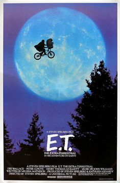 a movie poster for the film e t with a person on a bicycle in front of a full moon