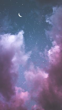 the sky is filled with stars and clouds