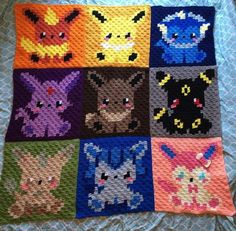 a crocheted blanket with pokemon characters on it