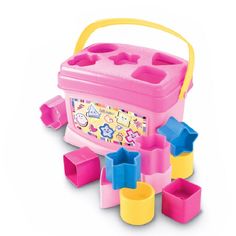 a pink and yellow plastic toy with lots of blocks in it's case on a white background