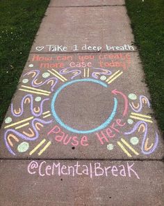 sidewalk chalk art with words written on it