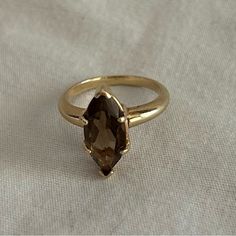 Classic (Maybe Vintage) Smoky Topaz Or Quartz Ring. Not 100% Sure If It's Topaz Or Quartz. Gold Band, Nice Weight. There Are No Markings That Read 10-14-18 Karat So I'm Not Certain Which It Is.Looks Like Some Of My 14 K Pieces If I Had To Guess. Size 6.5 See Pics On The Ring Sizer For Exact Size See Pics For Color. It's A Beautiful, Brownish/Amber Stone. Smoke Free Home. Small Dog Friendly Home. No Return. Sale Is Final On This Piece. Smoky Topaz Ring, Smokey Quartz Ring Engagement, Brown Engagement Ring, Brown Engagement Rings, Smoky Quartz Engagement Ring, Smoky Quartz Ring, Smoky Topaz, Gem Ring, Amber Stone