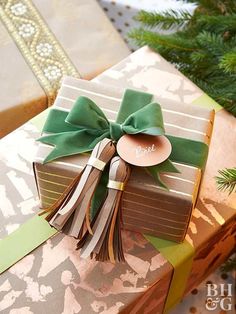 an image of a magazine page with presents wrapped in green and brown ribbon on it