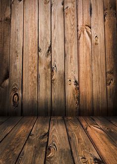 an old wooden wall with planks and wood flooring in the center is shown