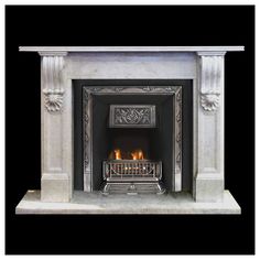 a white marble fireplace with an ornate design on the front and sides, surrounded by black background