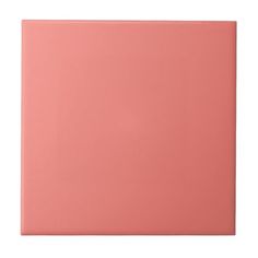 a pink square tile on a white background, with the top half painted in light pink