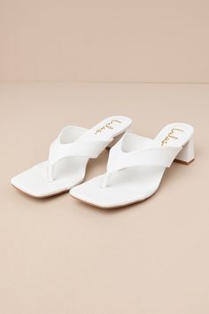 Dressing for sunny days should be simple, and that is why you'll reach for the Lulus Cachia White Textured High Heel Thong Sandals for easy style this season! These fun summer sandals feature a smooth faux leather construction that shapes a trendy square footbed and a thong upper. A chic-yet-comfortable block heel completes the perfectly cute look! 2" wrapped block heel. Lightly cushioned insole. Felted rubber sole has nonskid markings. Man made materials. Imported. Lulus | Cachia White High Hee High Heel Thong Sandals, Ivory Shoes, Casual Formal Dresses, White High Heels, Lulu Fashion, Easy Style, Casual Wedding Dress, Be Simple, Size 11 Heels